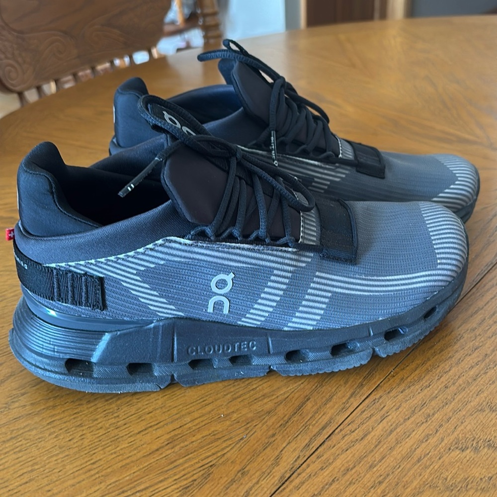 On Running Black and Gray Sneakers with Cloud Cushioning